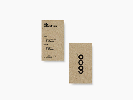 a brown color classic card design with font appealing design in a black color font some words were written: Optyk optometrysta